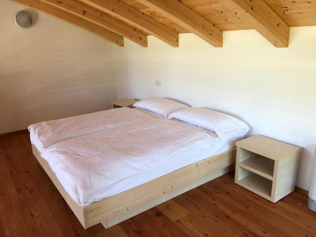 Postel nebo postele na pokoji v ubytování Resort Drena