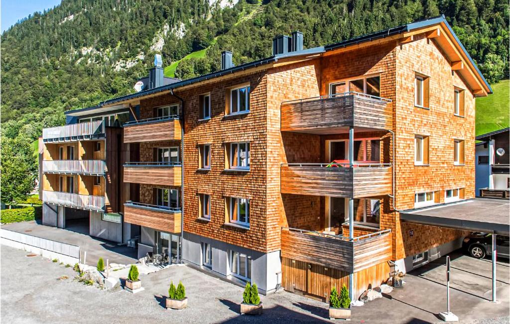 an apartment building with balconies on the side of it at Beautiful Apartment In Klsterle With Kitchenette in Klösterle am Arlberg