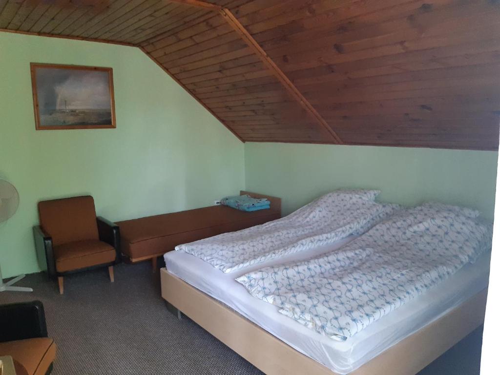 Ліжко або ліжка в номері Toldi Apartman