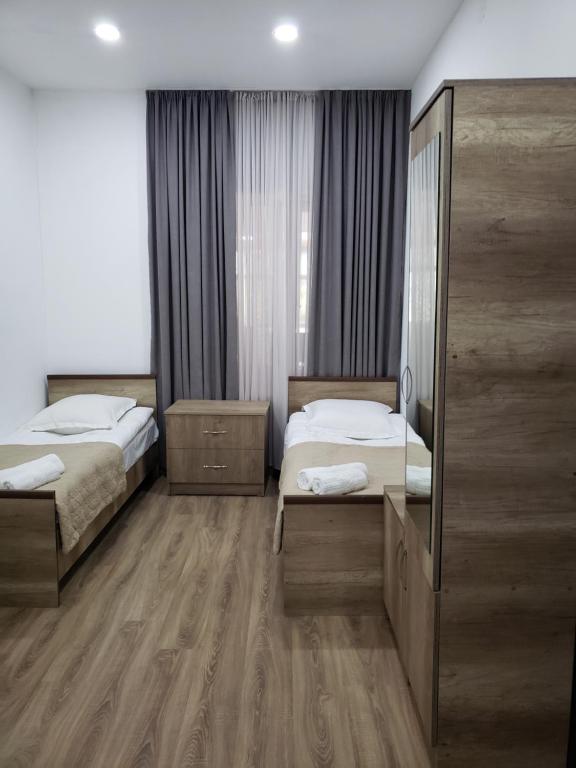 Postel nebo postele na pokoji v ubytování Guest House Nanu