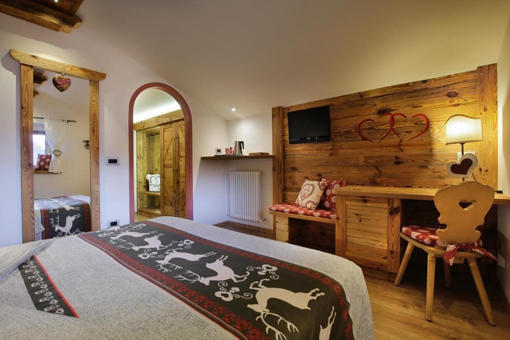 Postel nebo postele na pokoji v ubytování Hotel Azola