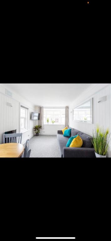 Ένα ή περισσότερα κρεβάτια σε δωμάτιο στο Driftwood Luxury Apartment