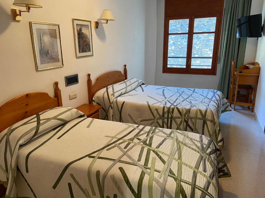 Postel nebo postele na pokoji v ubytování Hotel Puitavaca