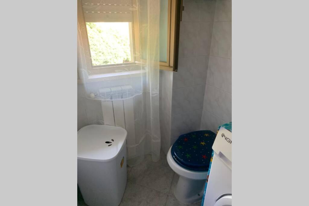 Łazienka w obiekcie Casa vacanza - I Mulini con parcheggio gratuito incluso.