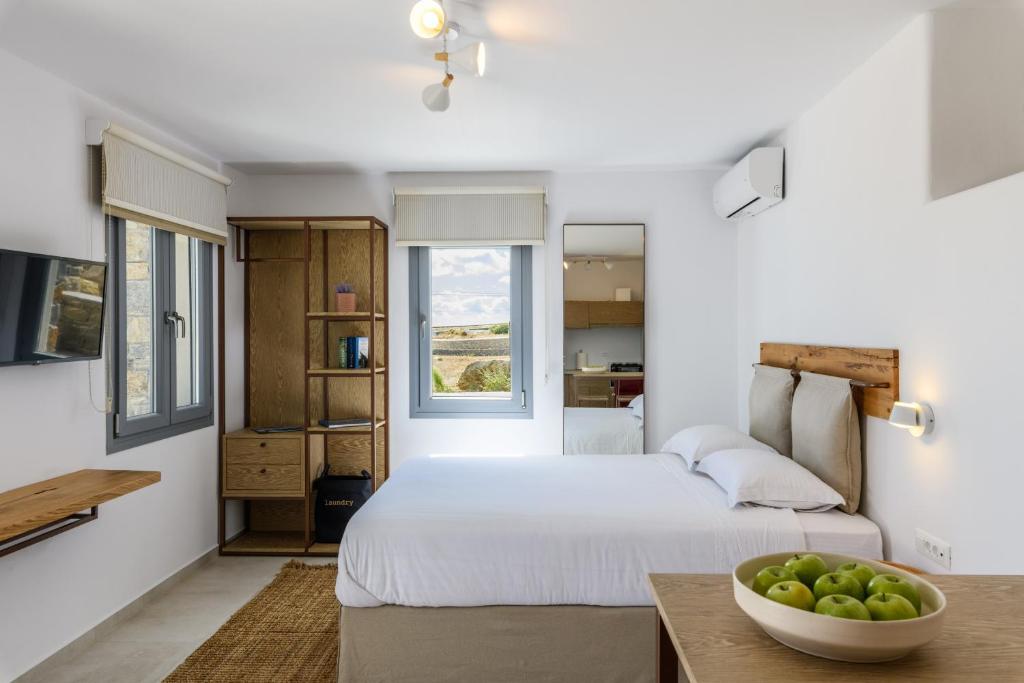 Posteľ alebo postele v izbe v ubytovaní Landi House Mykonos