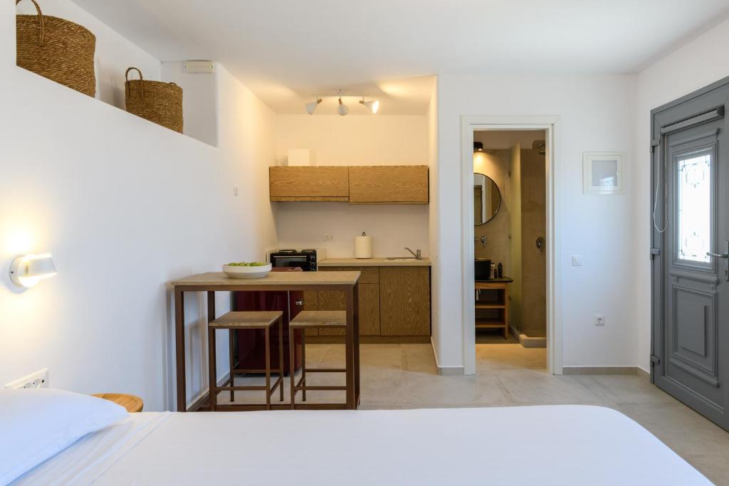Posteľ alebo postele v izbe v ubytovaní Landi House Mykonos