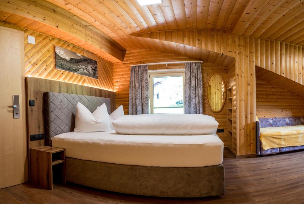Кровать или кровати в номере Sonnenhang Montafon