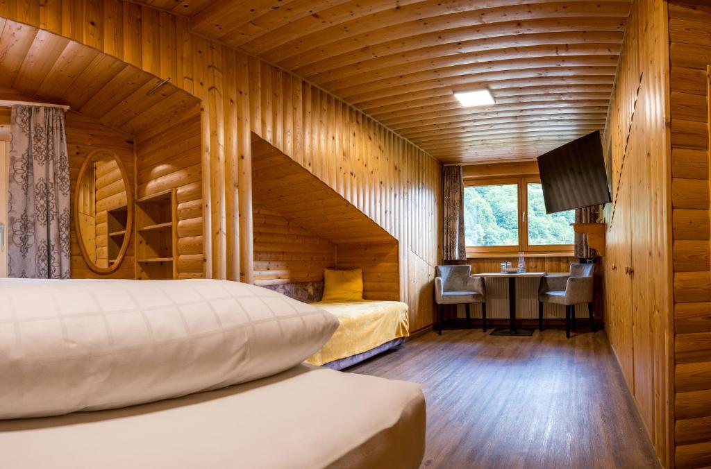 Letto o letti in una camera di Sonnenhang Montafon