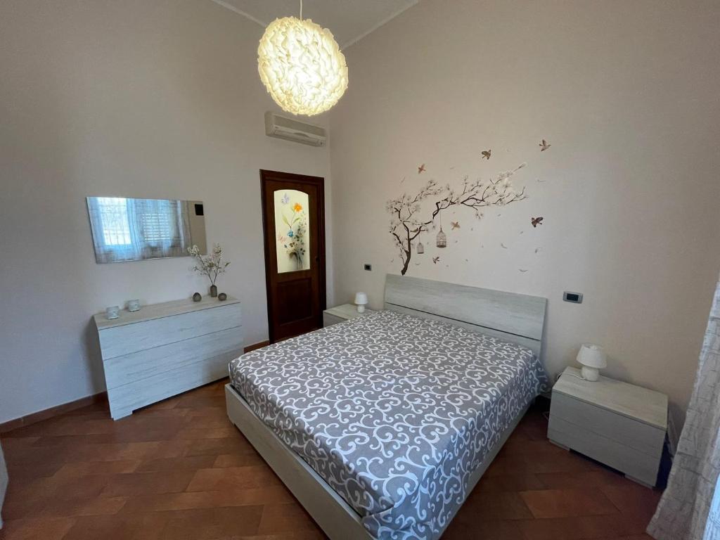 A bed or beds in a room at 34 Arena House