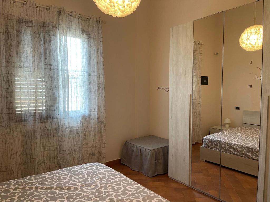 A bed or beds in a room at 34 Arena House