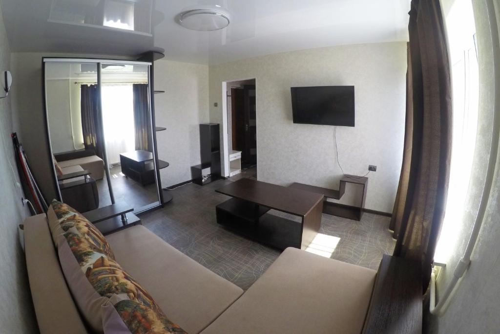 TV a/nebo společenská místnost v ubytování Уютная квартира со свежим ремонтом