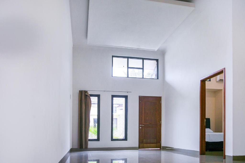 Fotografie z fotogalerie ubytování OYO 3438 Pasir Padi Inn Syariah v destinaci Kebinti