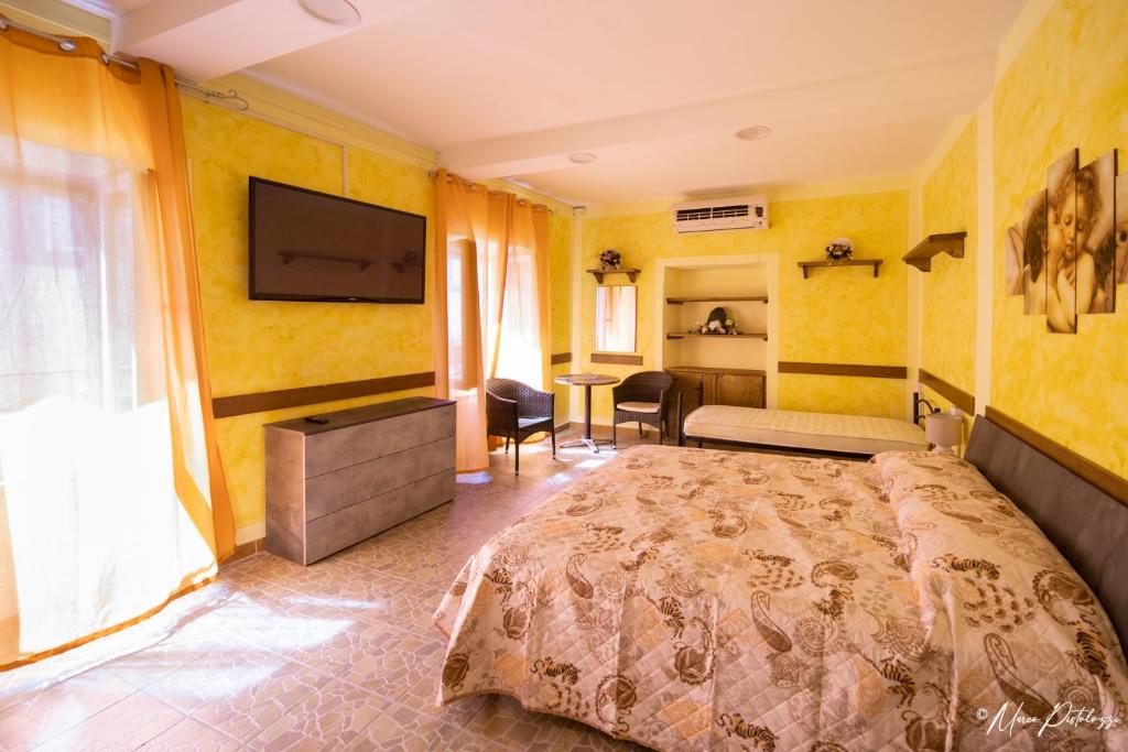 מיטה או מיטות בחדר ב-Da Castruccio degli Antelminelli