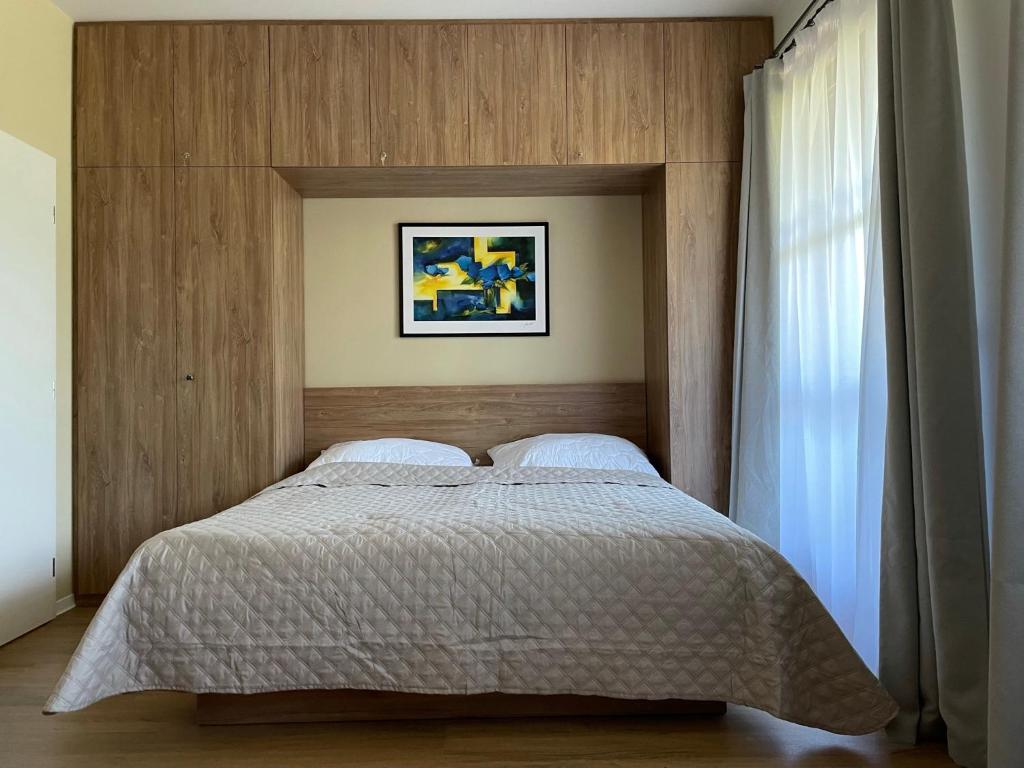 Postel nebo postele na pokoji v ubytování Apartmány NETA Velké Karlovice, Polanský Dvůr