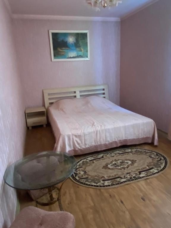 Postel nebo postele na pokoji v ubytování Атлант
