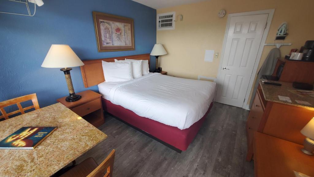 Postel nebo postele na pokoji v ubytování Sandbox Motel