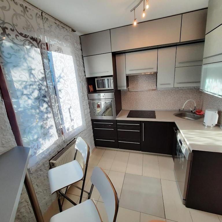Kuchyňa alebo kuchynka v ubytovaní Apartament Centrum