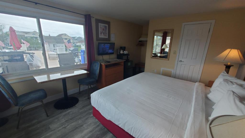 Postel nebo postele na pokoji v ubytování Sandbox Motel