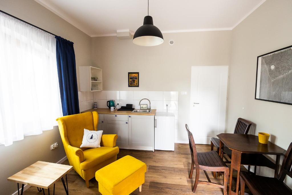 Posezení v ubytování Czar Mamry Apartamenty