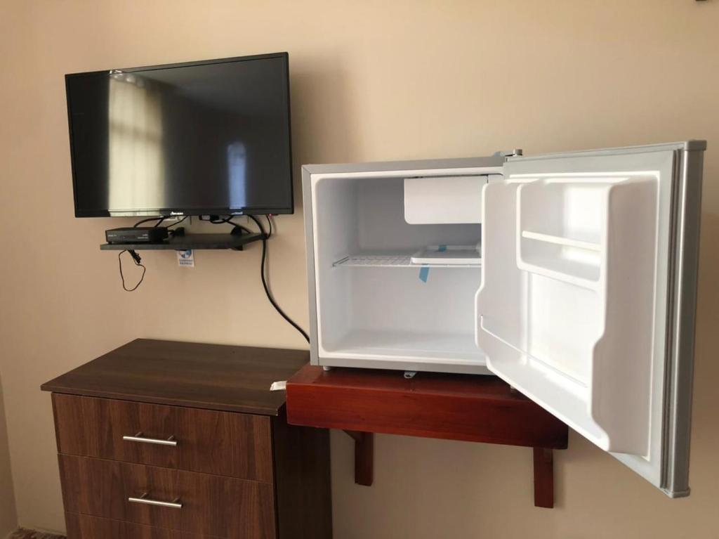 Kuchyň nebo kuchyňský kout v ubytování Hostal Malania