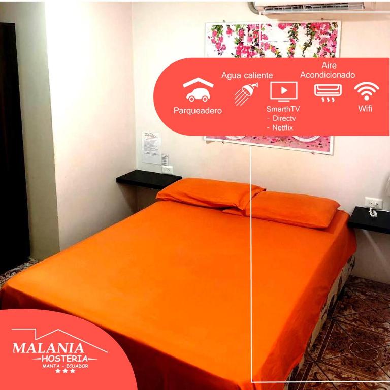 Postel nebo postele na pokoji v ubytování Hostal Malania