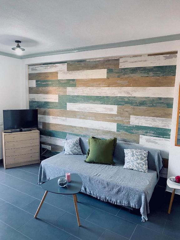 A television and/or entertainment centre at Perfect for exploring local areas and more