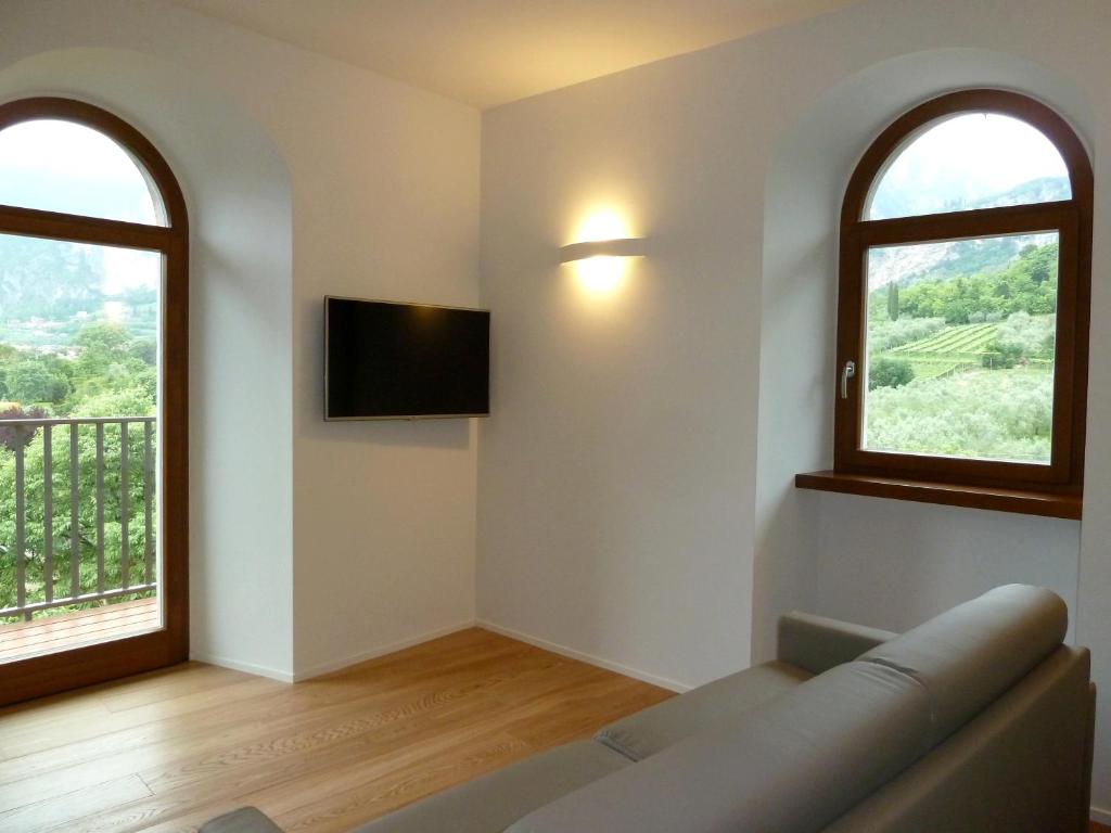 TV a/nebo společenská místnost v ubytování La Berlera - Riva del Garda