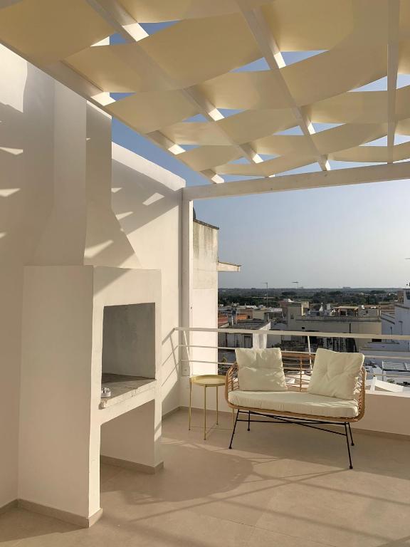 A balcony or terrace at Appartamento Magnolia Deluxe