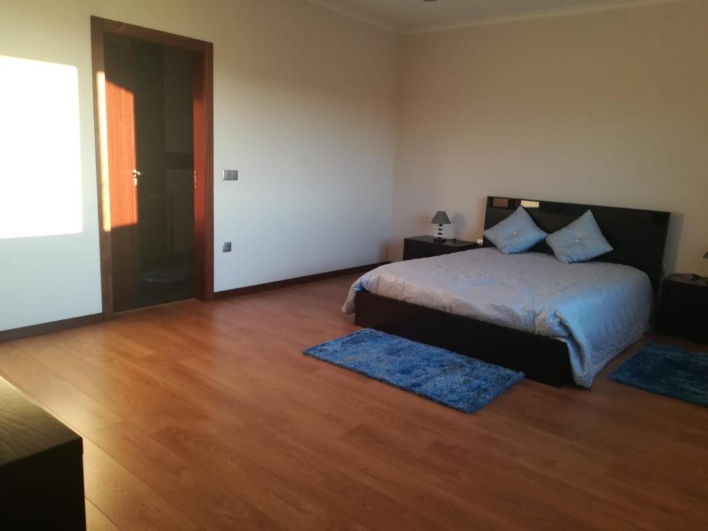 Postel nebo postele na pokoji v ubytování Casa da Batoca - Rossas