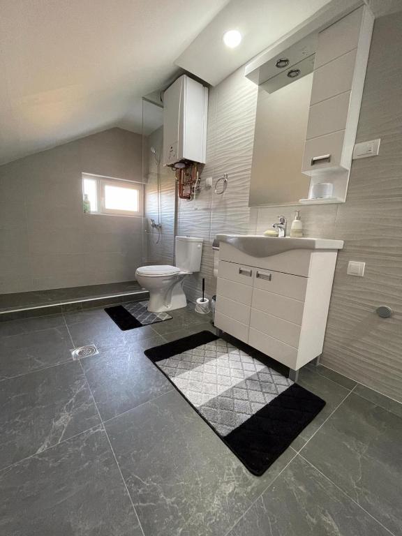 Koupelna v ubytování Apartman Ambijent
