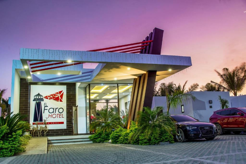 a car dealership with a car parked in front at Hotel El Faro in Monterrico