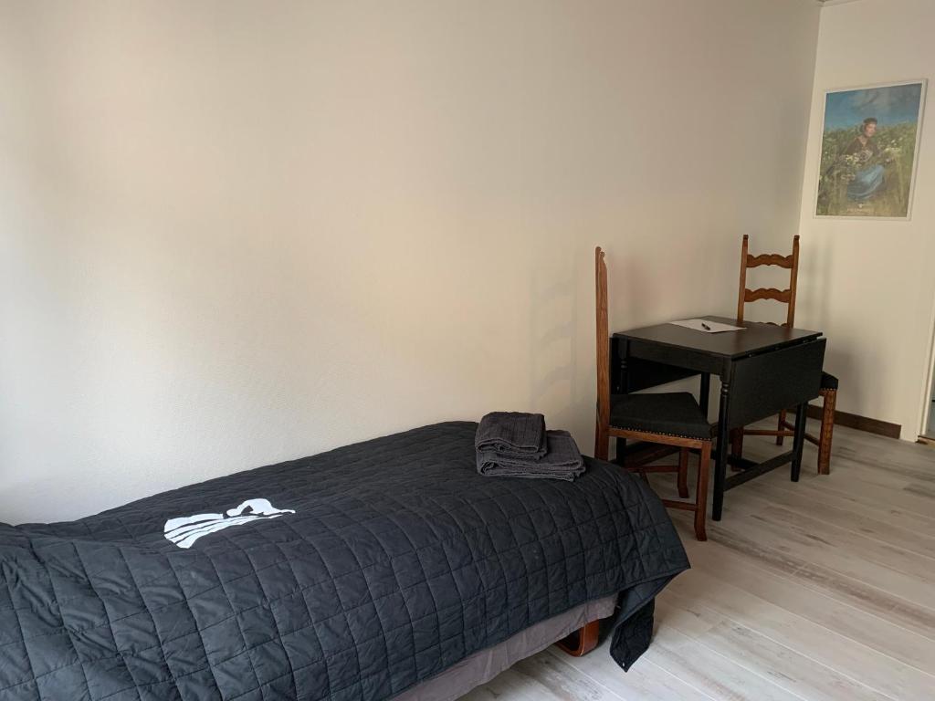 Postel nebo postele na pokoji v ubytování VikingBnB