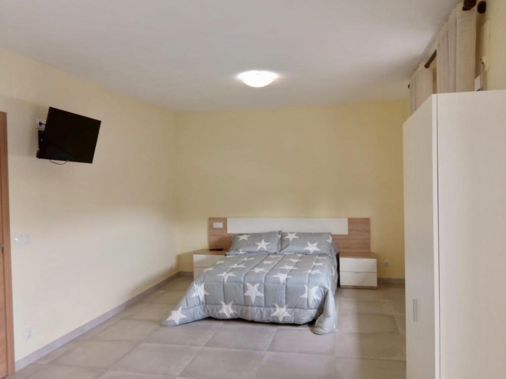 Posteľ alebo postele v izbe v ubytovaní La Villa Hostal