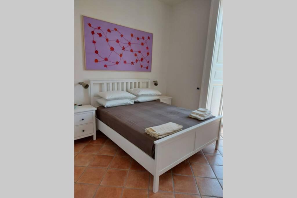 Posteľ alebo postele v izbe v ubytovaní Il balcone di Carmine