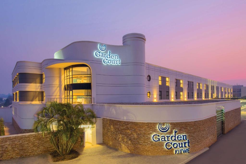 a rendering of a building with a circular court istg at Garden Court Kitwe in Kitwe