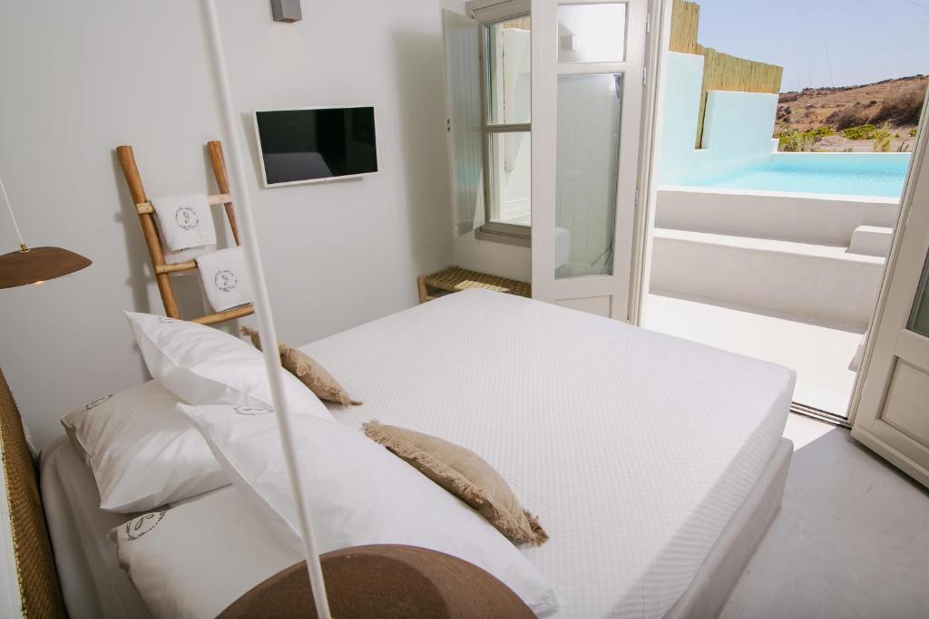 Postel nebo postele na pokoji v ubytování Thimari Lodge