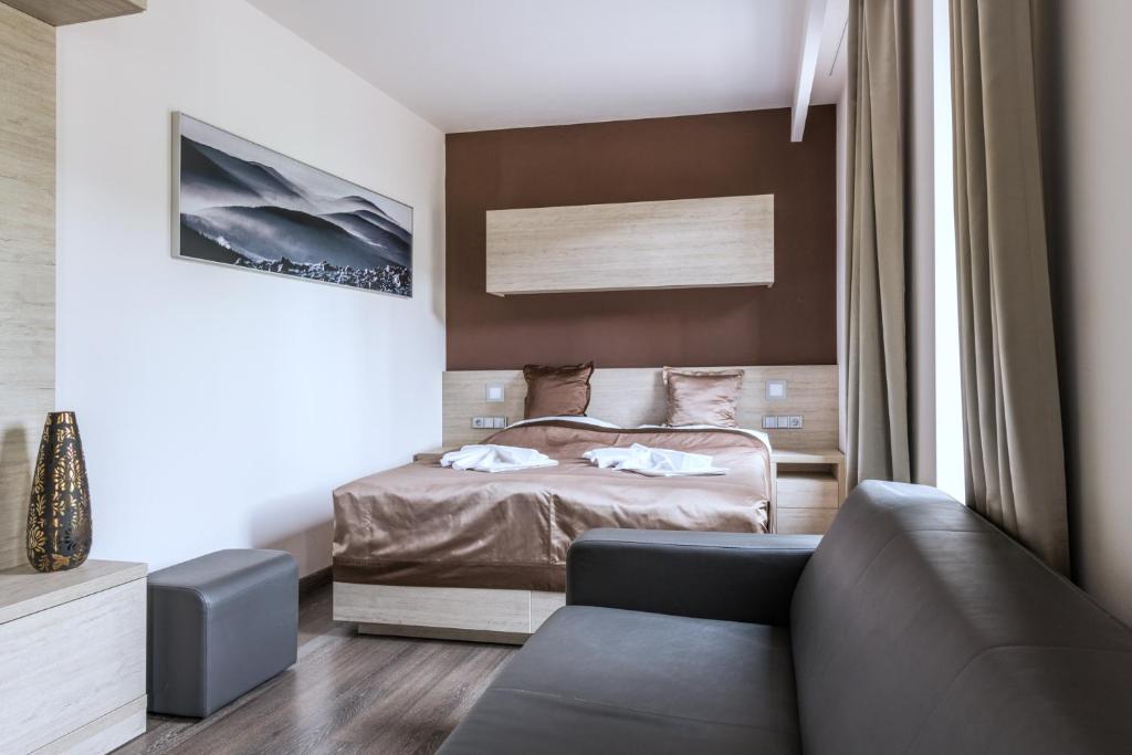 Postel nebo postele na pokoji v ubytování HOTEL PECR WELL