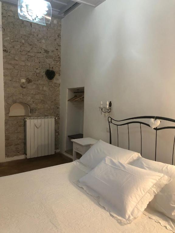 Posteľ alebo postele v izbe v ubytovaní B&B Le Principesse