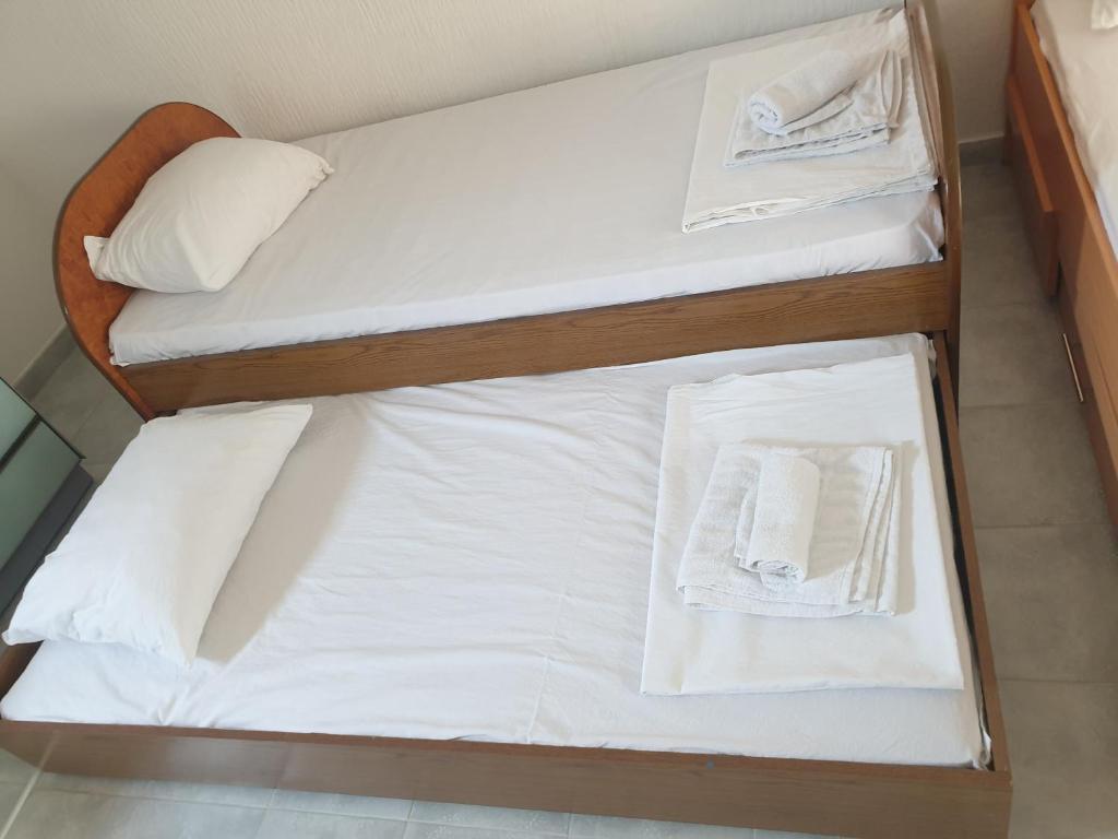 Postel nebo postele na pokoji v ubytování Apartman Sava