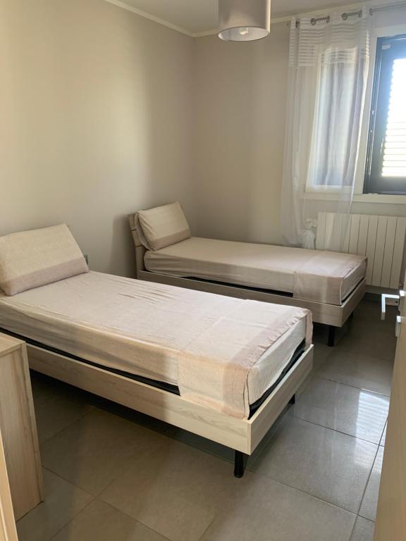 A bed or beds in a room at house231