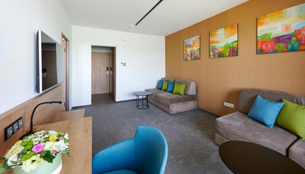 Posezení v ubytování Hotel OTP Balatonszemes