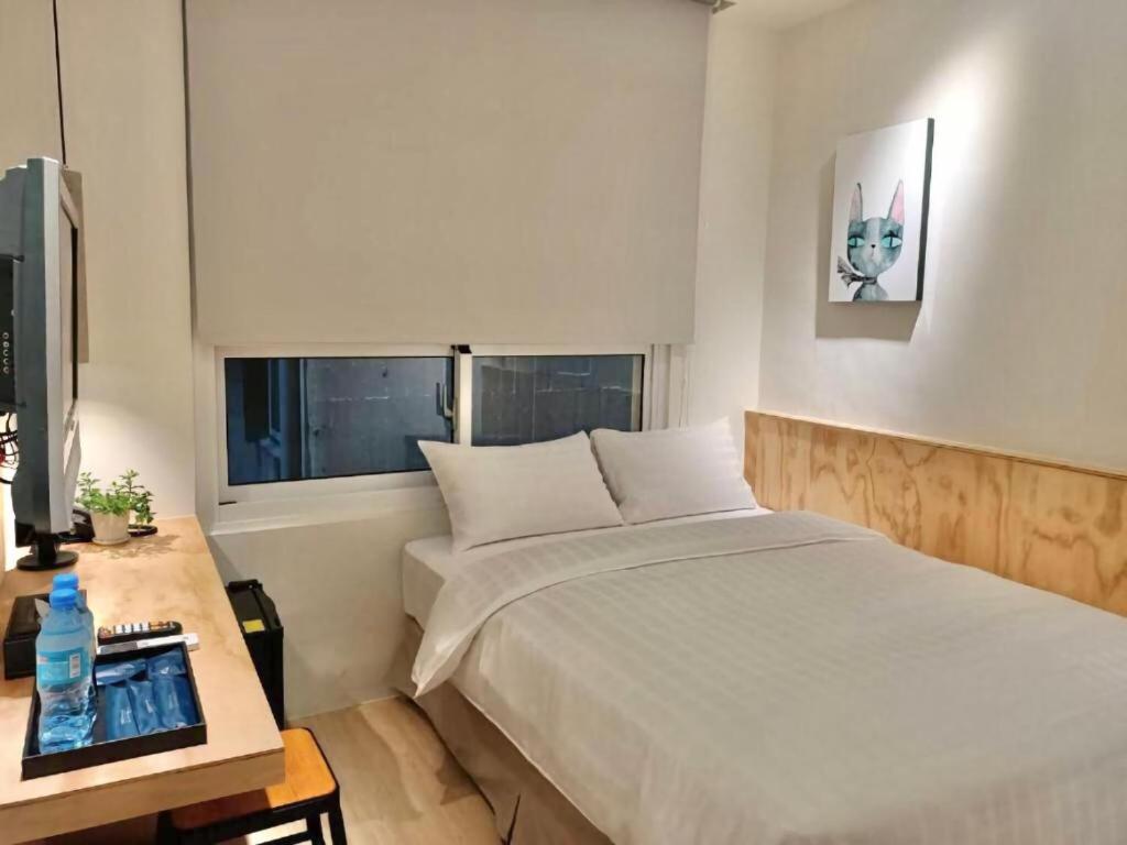 Postel nebo postele na pokoji v ubytování Home Rest Hotel 2