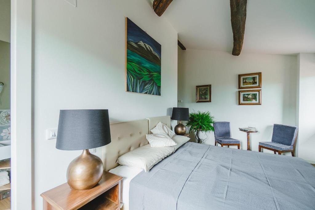 Postel nebo postele na pokoji v ubytování Agriturismo Le Fonti