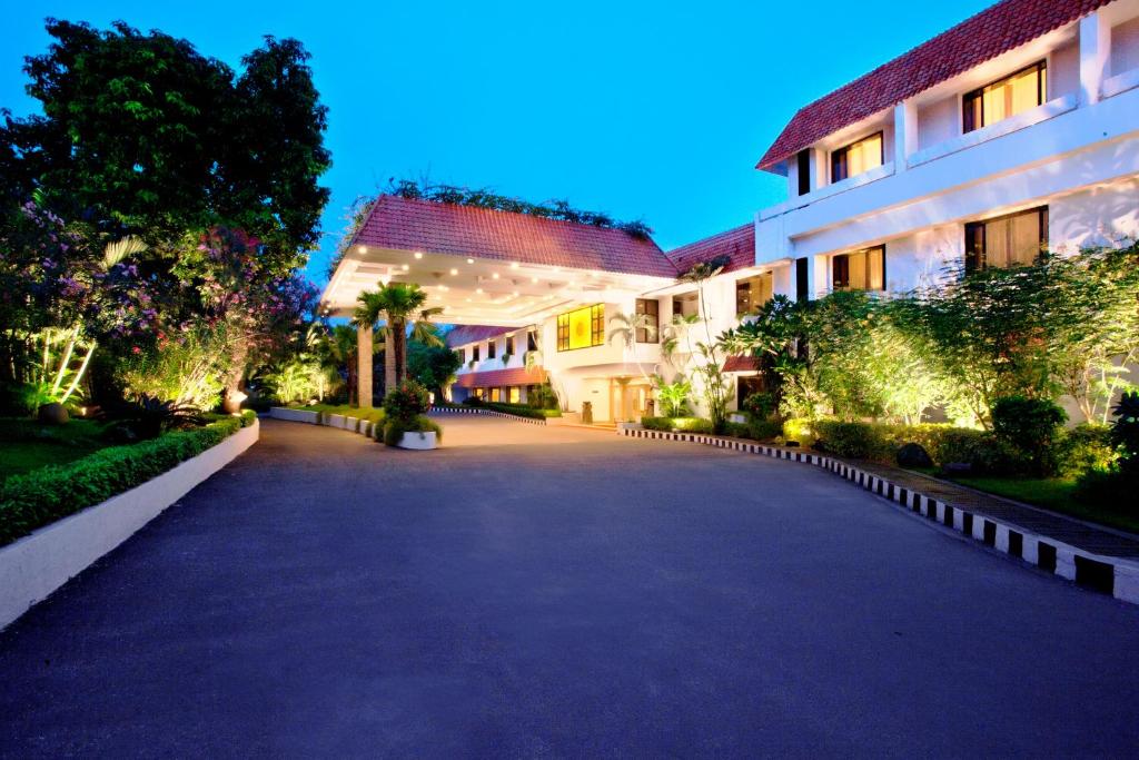 a driveway leading to a building at night at Trident Chennai in Chennai