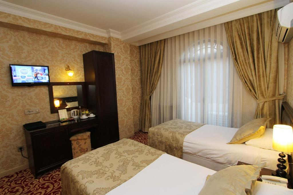 Postel nebo postele na pokoji v ubytování Balin Hotel - Special Category
