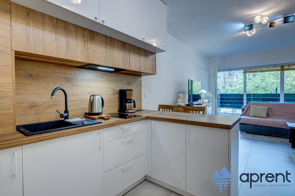 Kuchyňa alebo kuchynka v ubytovaní Apartament SOLE - Aprent