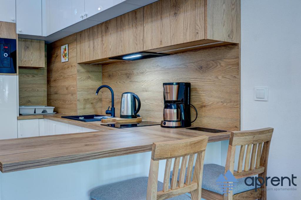 Kuchyňa alebo kuchynka v ubytovaní Apartament SOLE - Aprent