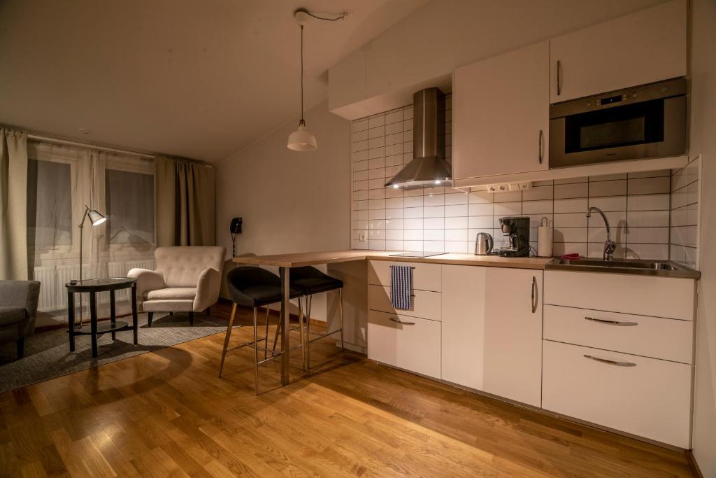 Kuchyň nebo kuchyňský kout v ubytování Simloc Hotel Drottninggatan