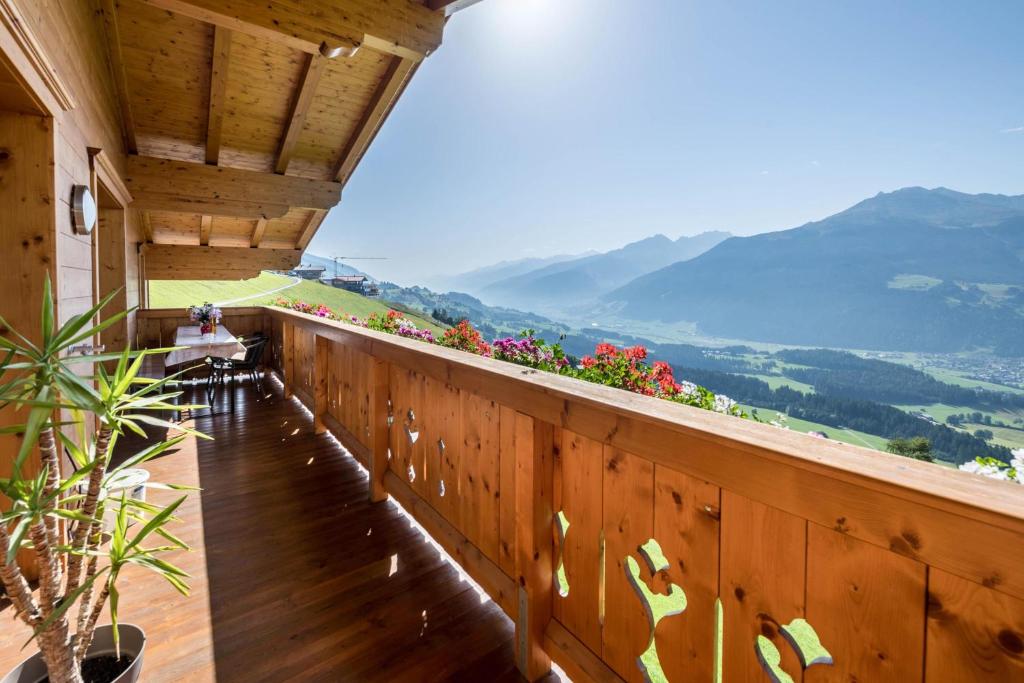 a balcony of a house with a view of mountains at Ferienwohnung Alpschwendthof in Mittersill