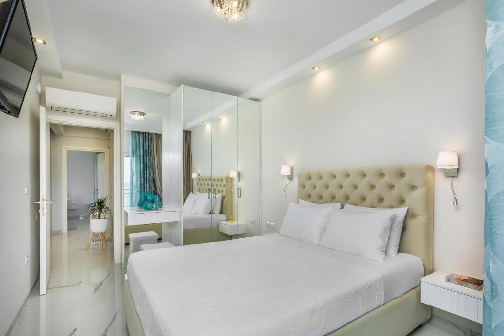 Postel nebo postele na pokoji v ubytování Beach Front Casa Elena